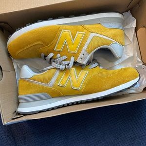 Size 10.5 New Balance 574 yellow/gold